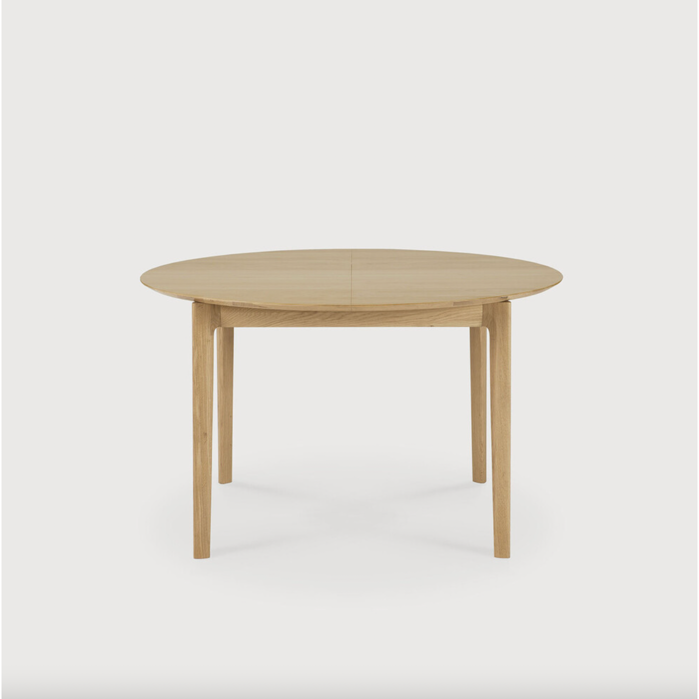 Featuring Oak Bok Round Extendable Dining Table by Ethnicraft at Amethyst Home. This Oak Bok Round Extendable Dining Table offers the perfect solution for adaptable dining within a smaller space. The iconic airy shape and solid construction make for a timeless design to enjoy for years to come.
Material: Oak, 100% Solid WoodFinish: Oiled
Dimensions: 51.  Amethyst Home provides interior design, new home construction design consulting, vintage area rugs, and lighting in the Winter Garden metro area.