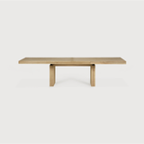 Featuring Oak Double Extendable Dining Table by Ethnicraft at Amethyst Home. We love the solid look and pure lines of this Oak Double Extendable Dining Table.   Although the table looks heavy, it can very easily be extended single-handedly. It takes a few steps and no more than seconds to make space for whatever will be happening next in your home!
Material: O.  Amethyst Home provides interior design, new home construction design consulting, vintage area rugs, and lighting in the Miami metro area.