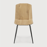 Featuring Oak Facette Dining Chair by Ethnicraft at Amethyst Home. This Oak Facette Dining Chair is both timeless, yet reflecting. We are so intrigued by this chair's ingenious wooden structure that is divided into facets, which makes the seating more comfortable and unique. This beautiful chair will add a sculptural element to your dining table or kitchen!
.  Amethyst Home provides interior design, new home construction design consulting, vintage area rugs, and lighting in the Houston metro area.