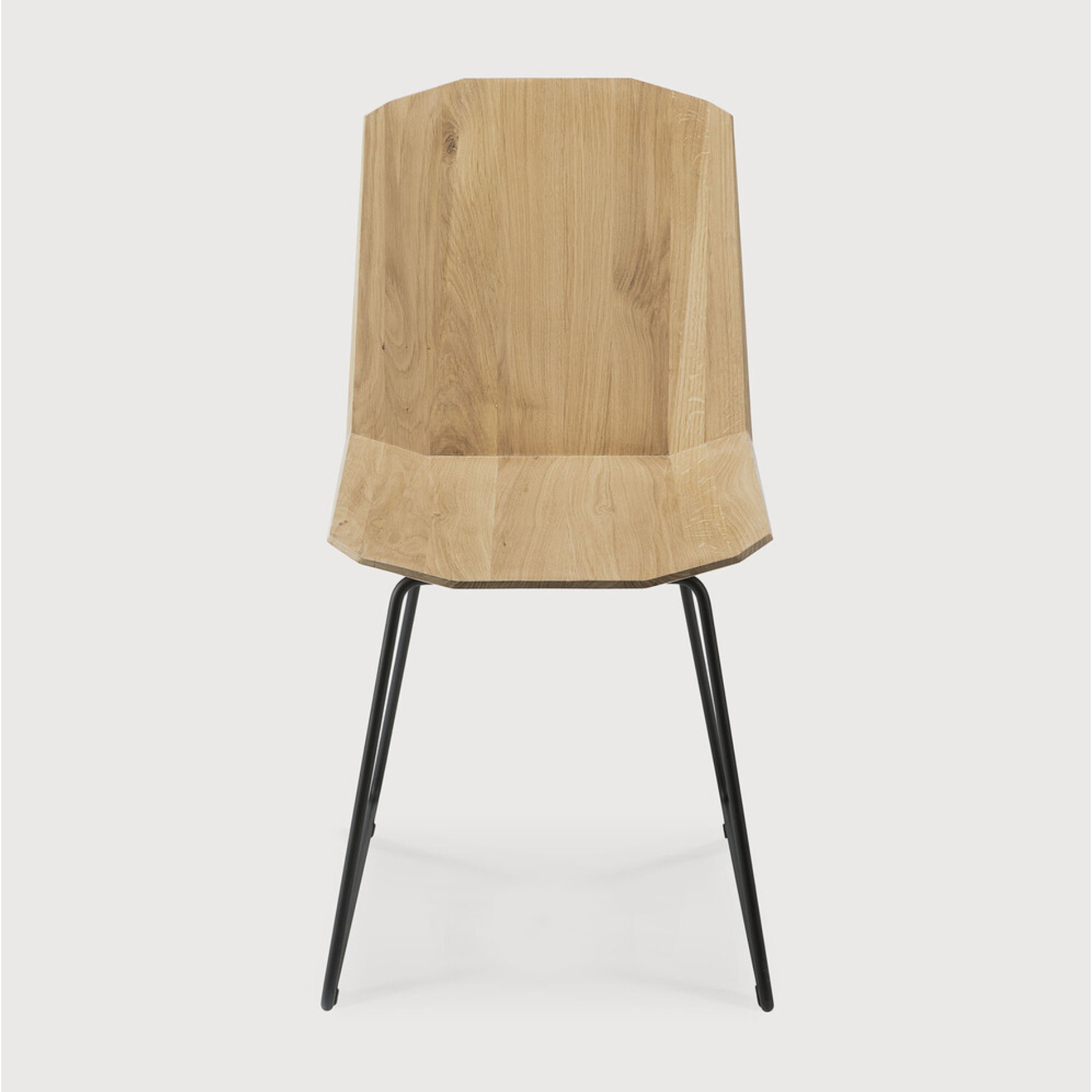 Featuring Oak Facette Dining Chair by Ethnicraft at Amethyst Home. This Oak Facette Dining Chair is both timeless, yet reflecting. We are so intrigued by this chair's ingenious wooden structure that is divided into facets, which makes the seating more comfortable and unique. This beautiful chair will add a sculptural element to your dining table or kitchen!
.  Amethyst Home provides interior design, new home construction design consulting, vintage area rugs, and lighting in the Houston metro area.