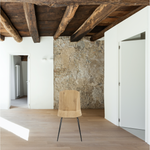 Featuring Oak Facette Dining Chair by Ethnicraft at Amethyst Home. This Oak Facette Dining Chair is both timeless, yet reflecting. We are so intrigued by this chair's ingenious wooden structure that is divided into facets, which makes the seating more comfortable and unique. This beautiful chair will add a sculptural element to your dining table or kitch.  Amethyst Home provides interior design, new home construction design consulting, vintage area rugs, and lighting in the Los Angeles metro area.