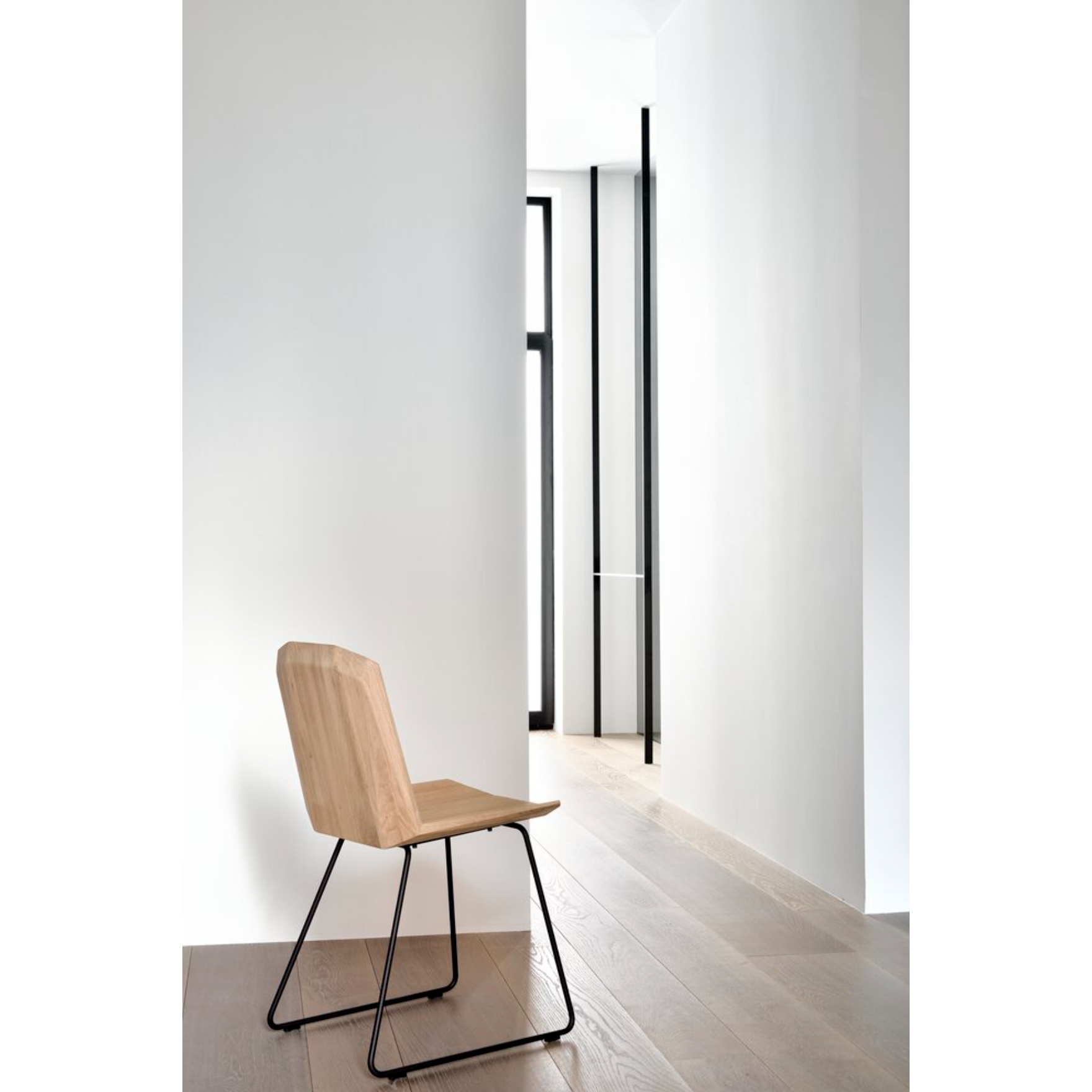 Featuring Oak Facette Dining Chair by Ethnicraft at Amethyst Home. This Oak Facette Dining Chair is both timeless, yet reflecting. We are so intrigued by this chair's ingenious wooden structure that is divided into facets, which makes the seating more comfortable and unique. This beautiful chair will add a sculptural element to your dining table or kitchen!
D.  Amethyst Home provides interior design, new home construction design consulting, vintage area rugs, and lighting in the Austin metro area.