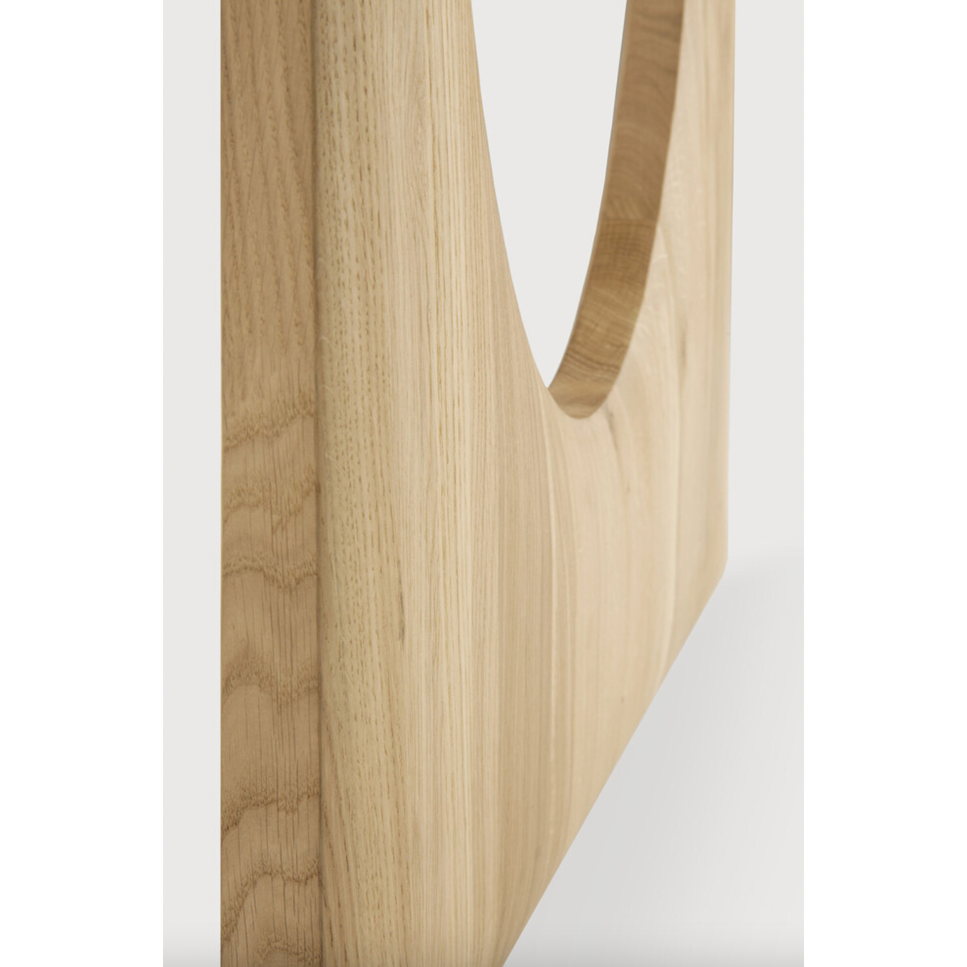 Featuring Oak Geometric Dining Table by Ethnicraft at Amethyst Home. With enriched shapes and unexpected details, this Oak Geometric Dining Table is a statement item. Luxury comes with its length, which is offset by softened edges and natural lines -- perfect for any dining room or workspace. 
Material: Oak, 100% Solid WoodFinish: Oiled
Dimensions: 98.5"w.  Amethyst Home provides interior design, new home construction design consulting, vintage area rugs, and lighting in the Washington metro area.