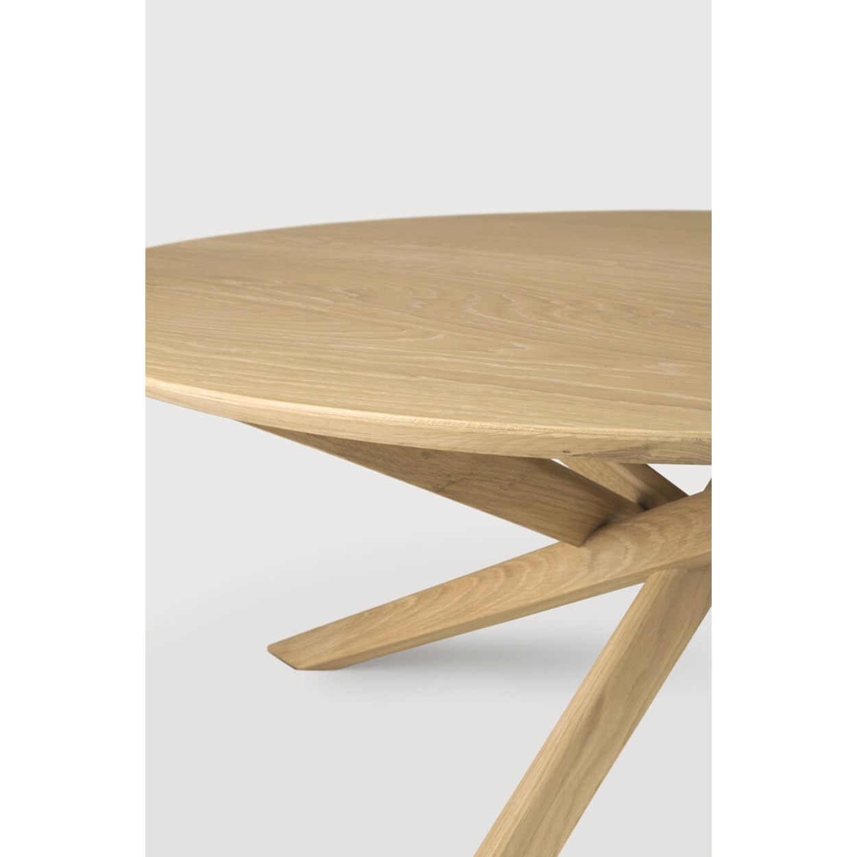 Featuring Oak Mikado Coffee Table by Ethnicraft at Amethyst Home. The Oak Mikado Coffee Table, designed by Alain van Havre, is a study of balance and symmetry. The interested base brings a unique look to any living room or lounge area!
Oval Dimension: 56.5"w x 26.5"d x 17"h Weight: 35 lbs
Round Dimension: 39.5"w x 39.5"d x 17"hWeight: 40 lbs
Material: Oa.  Amethyst Home provides interior design, new home construction design consulting, vintage area rugs, and lighting in the Los Angeles metro area.