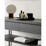 Featuring Oak Monolit Console Table - Black by Ethnicraft at Amethyst Home. Balance and function come together in the Monolit console table. This simple, sleek table includes storage and we LOVE hidden storage! Dress up your living room or office with a piece that is both functional and stylish!
Dimensions: 48.5"w x 16"d x 33.5"h Weight: 77 lbs
Material: O.  Amethyst Home provides interior design, new home construction design consulting, vintage area rugs, and lighting in the Charlotte metro area.