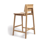 Featuring Oak N3 Counter Stool by Ethnicraft at Amethyst Home. We love the versatility of this Oak N3 counter stool. Designed by Nathan Yong, this stool is a timeless piece that adds both modern lines and a cozy organic aesthetic to your bar area or kitchen island.
Dimensions: 19.5"w x 20"d x 36"hSeat Height: 26"
Material: Oak, 100% Solid WoodFinish: Oiled.  Amethyst Home provides interior design, new home construction design consulting, vintage area rugs, and lighting in the Charlotte metro area.