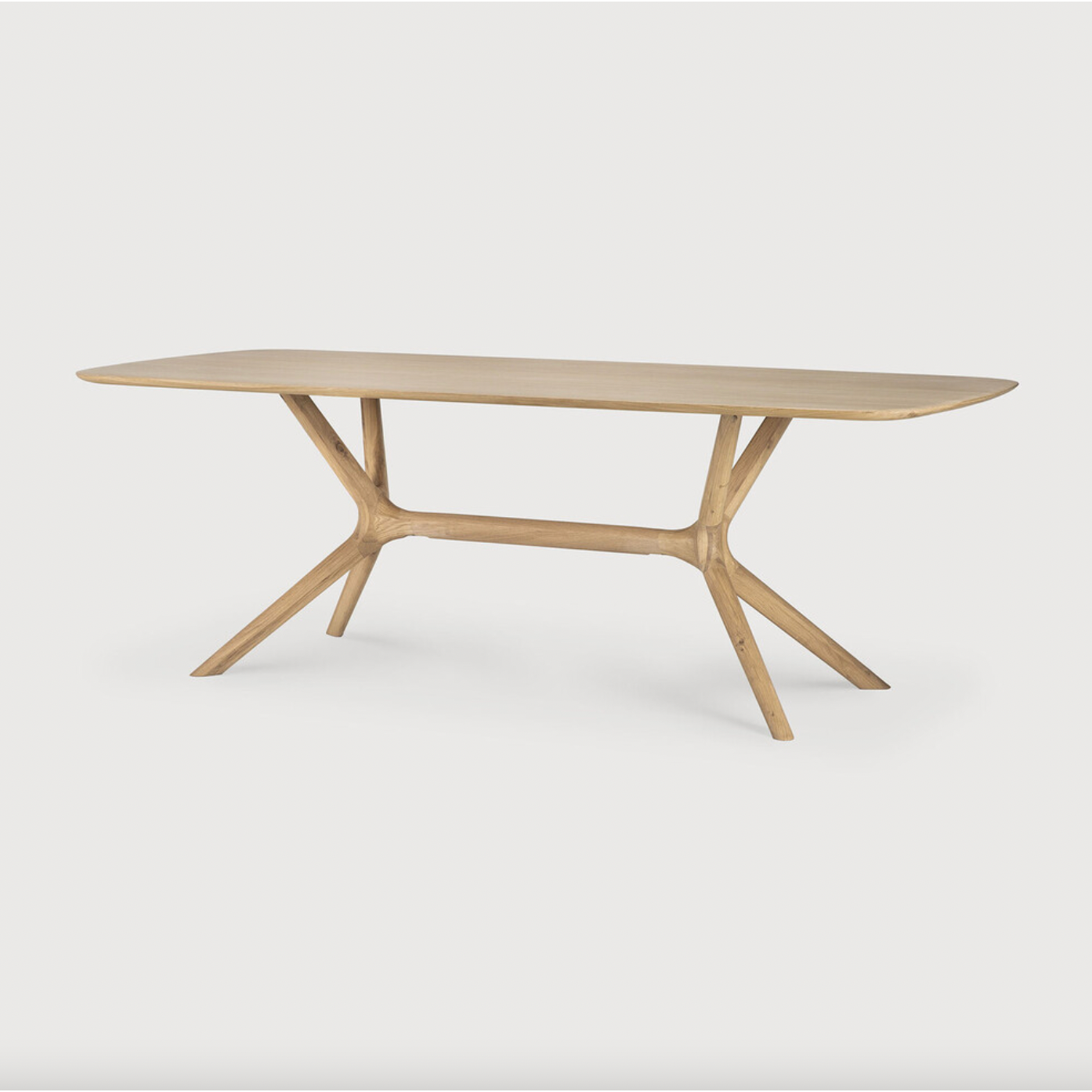 Featuring Oak X Dining Table by Ethnicraft at Amethyst Home. This Oak X Dining Table features sturdy, yet intricate, construction and is a true work of art and a credit to the most advanced woodworking techniques. With a seamless structural interplay between the unique shape of the legs and the soft lines of the tabletop, guests will enjoy the most comfort.  Amethyst Home provides interior design, new home construction design consulting, vintage area rugs, and lighting in the Calabasas metro area.