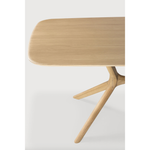 Featuring Oak X Dining Table by Ethnicraft at Amethyst Home. This Oak X Dining Table features sturdy, yet intricate, construction and is a true work of art and a credit to the most advanced woodworking techniques. With a seamless structural interplay between the unique shape of the legs and the soft lines of the tabletop, guests will enjoy the most comfo.  Amethyst Home provides interior design, new home construction design consulting, vintage area rugs, and lighting in the Kansas City metro area.