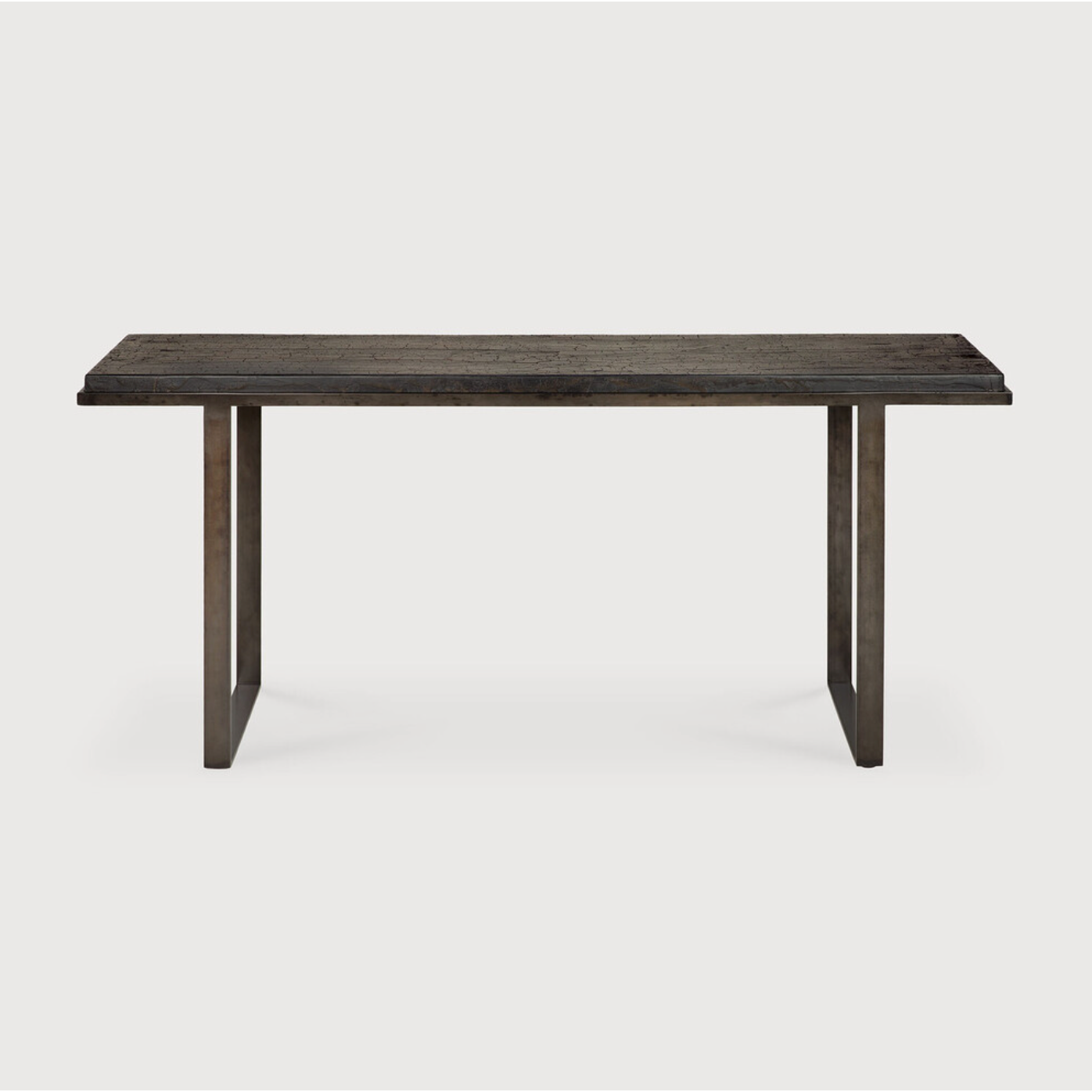 Featuring Stability Console Table - Umber by Ethnicraft at Amethyst Home. The deep surface of the Stability console is shaped by hand by skilled artisans. Natural mineral powders and color pigments blend to form the console's unique finish. We love how this piece's simple lines showcase the clean beauty of well-crafted metal work. We imagine this unique pie.  Amethyst Home provides interior design, new home construction design consulting, vintage area rugs, and lighting in the Portland metro area.