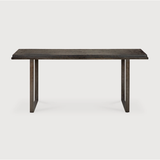 Featuring Stability Console Table - Umber by Ethnicraft at Amethyst Home. The deep surface of the Stability console is shaped by hand by skilled artisans. Natural mineral powders and color pigments blend to form the console's unique finish. We love how this piece's simple lines showcase the clean beauty of well-crafted metal work. We imagine this unique pie.  Amethyst Home provides interior design, new home construction design consulting, vintage area rugs, and lighting in the Portland metro area.