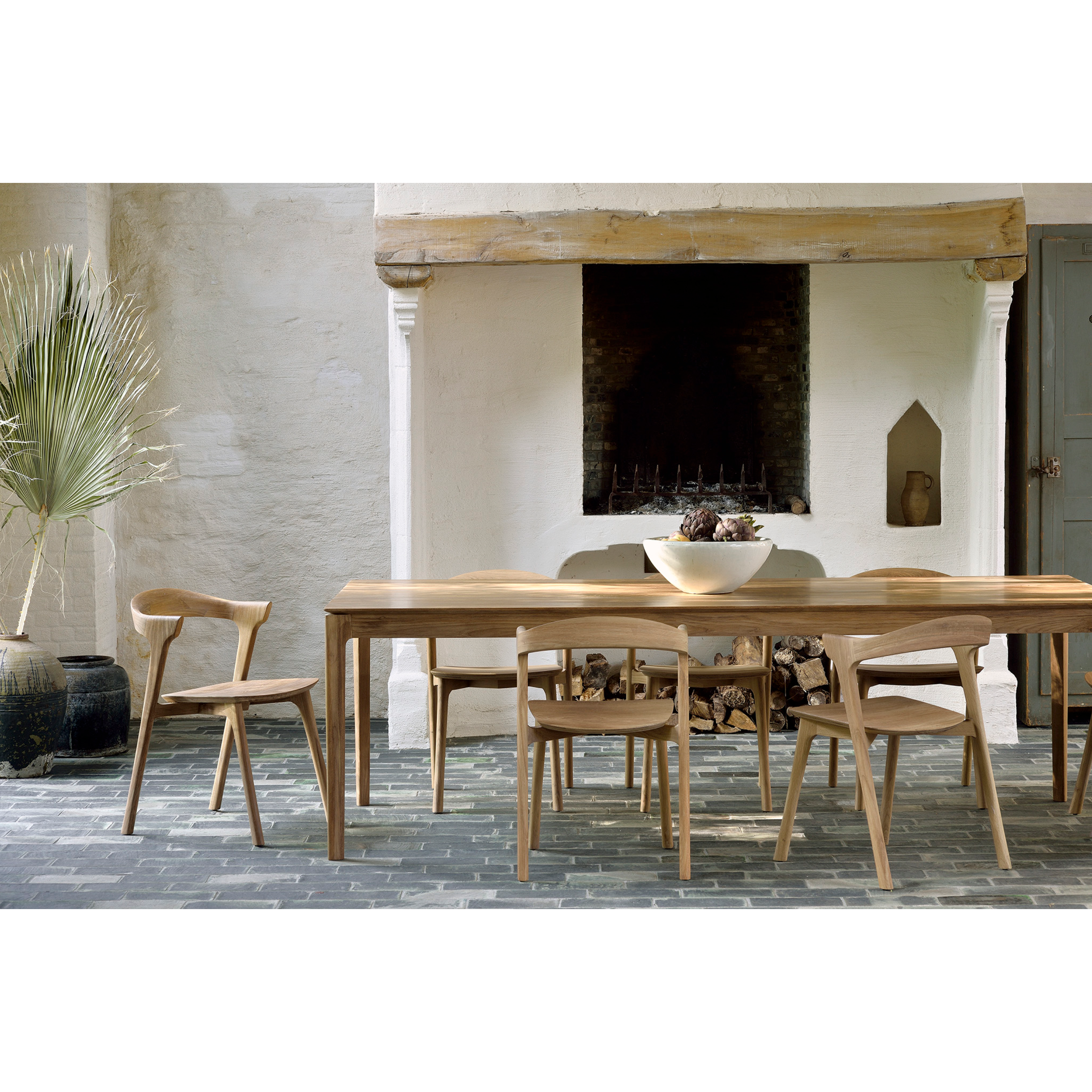 Featuring Teak Bok Dining Chair by Ethnicraft at Amethyst Home. This Teak Bok Dining Chair features an airy shape with rock-solid construction,  making this piece a timeless and remarkable design to enjoy for years to come. Pair with a dining table or stand-alone against a wall, hallway, or end of the bed! Designed by Alain can Havre
Dimensions: 20"w x 21.5"d.  Amethyst Home provides interior design, new home construction design consulting, vintage area rugs, and lighting in the Dallas metro area.