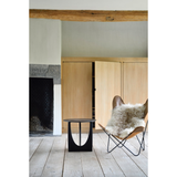 Featuring Oak Geometric Side Table - Black by Ethnicraft at Amethyst Home. From any angle, the Oak Geometric Side Table does not only look different, it also becomes different. We love seeing this table as a sculptural accent to your living space or office.Designed by Alain van Havre
Dimensions: 20.5"w x 20.5"d x 20"h Weight: 11 lbs
Material: OakFinish: Varn.  Amethyst Home provides interior design, new home construction design consulting, vintage area rugs, and lighting in the Houston metro area.