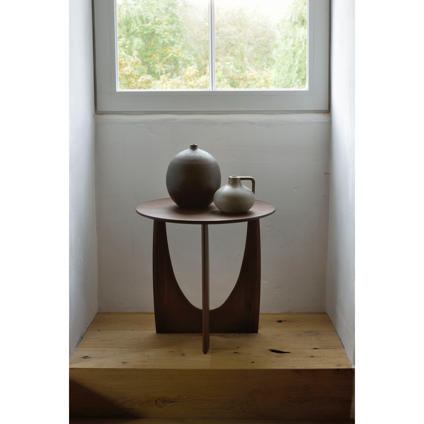 Featuring Teak Geometric Side Table - Brown by Ethnicraft at Amethyst Home. From any angle, the Teak Geometric Side Table does not only look different, it also becomes different. We love seeing this table as a sculptural accent to your living space or office.Designed by Alain van Havre
Dimensions: 20.5"w x 20.5"d x 20"h Weight: 11 lbs
Material: TeakFinish:.  Amethyst Home provides interior design, new home construction design consulting, vintage area rugs, and lighting in the Nashville metro area.