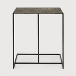 Featuring Triptic Side Table - Lava Whisky by Ethnicraft at Amethyst Home. The Triptic table is a chic and practical side table that could sit perfectly with your sofa, ideal for a laptop or beverages. We love how this little table will elevate your living space aesthetically and functionally! We can't get enough of this distinctive table top finish that i.  Amethyst Home provides interior design, new home construction design consulting, vintage area rugs, and lighting in the Charlotte metro area.