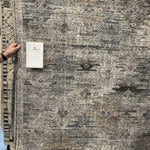 The Rize Nakoda Area Rug offers intricate and delicately designed global patterns to the modern home. A dynamic tribal motif creates an all-over design on the artistically distressed Nakoda area rug. In a black, tan, white, and blue colorway, this durable hand-knotted wool accent blends a timeless craft with contemporary charm. This is gorgeous choice for any living room, bedroom, or other high traffic area.   Hand Knotted 100% Wool RIZ08