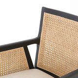 Featuring Antonia Cane Brushed Ebony Dining Armchair by Four Hands at Amethyst Home. We loved the retro look of this Antonia Cane Dining Armchair - Brushed Ebony. The brushed ebony nettlewood frames paired with the natural cane brings the perfect contract to any dining room or kitchen area. 
Overall Dimensions: 22.75"W x 23.50"L x 33"HColors: Light Natural Ca.  Amethyst Home provides interior design, new home construction design consulting, vintage area rugs, and lighting in the Austin metro area.