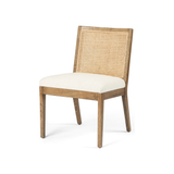 Featuring Charlotte Armless Dining Chair - Cane Toasted Nettlewood by Four Hands at Amethyst Home. Coastal aesthetic and daily comfort -- the Charlotte Dining Chair is an Amethyst fave.  It's perfect for blending wood tones in a space due to the two tone cane back.  Upholstered in a performance fabric for stress-free daily use.
Overall Dimensions: 22.50"W .  Amethyst Home provides interior design, new home construction design consulting, vintage area rugs, and lighting in the San Diego metro area.