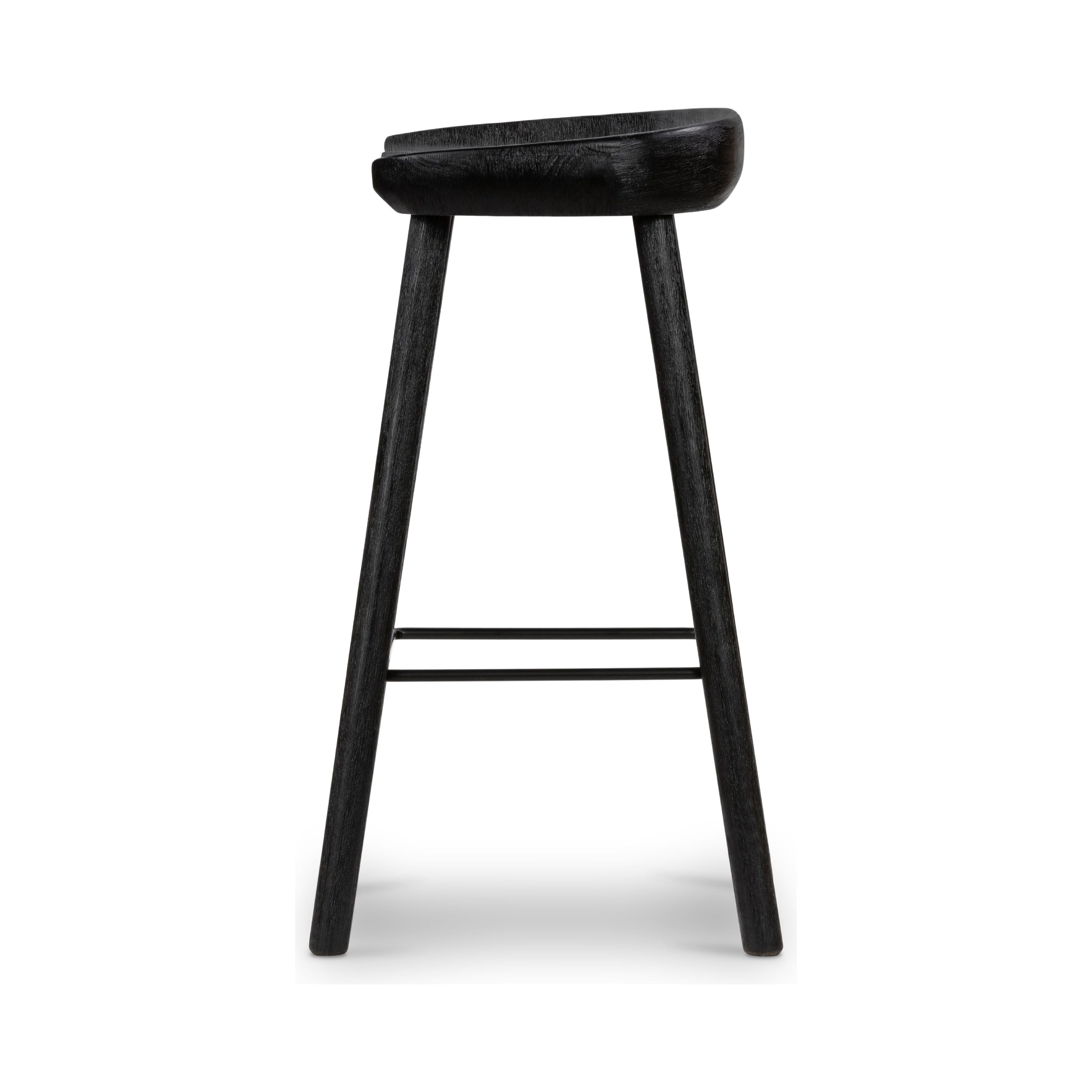 Featuring Barrett Counter Stool - Matte Black by Four Hands at Amethyst Home. The Barrett Matte Black Bar and Counter Stool is sculpted for comfort. Crafted from rich parawood, black iron stretchers lend an updated look to simply styled bar or counter seating finished in a sleek matte black.
Colors: Matte Black Parawood, Matte Black IronMaterials: Solid P. Amethyst Home provides interior design, new home construction design consulting, vintage area rugs, and lighting in the Kansas City metro area.