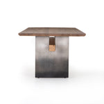 Featuring Brennan Dining Table - Dove Oak by Four Hands at Amethyst Home. This Brennan Dining Table - Dove Oak has a rectangular soft-grey oak tabletop and flaunts its materials' natural graining, for a richly organic takeaway. Wide, plank-style legs of pewter-finished steel features an ombre pattern -- a statement piece for any dining room or kitchen area.  Amethyst Home provides interior design, new home construction design consulting, vintage area rugs, and lighting in the Charlotte metro area.