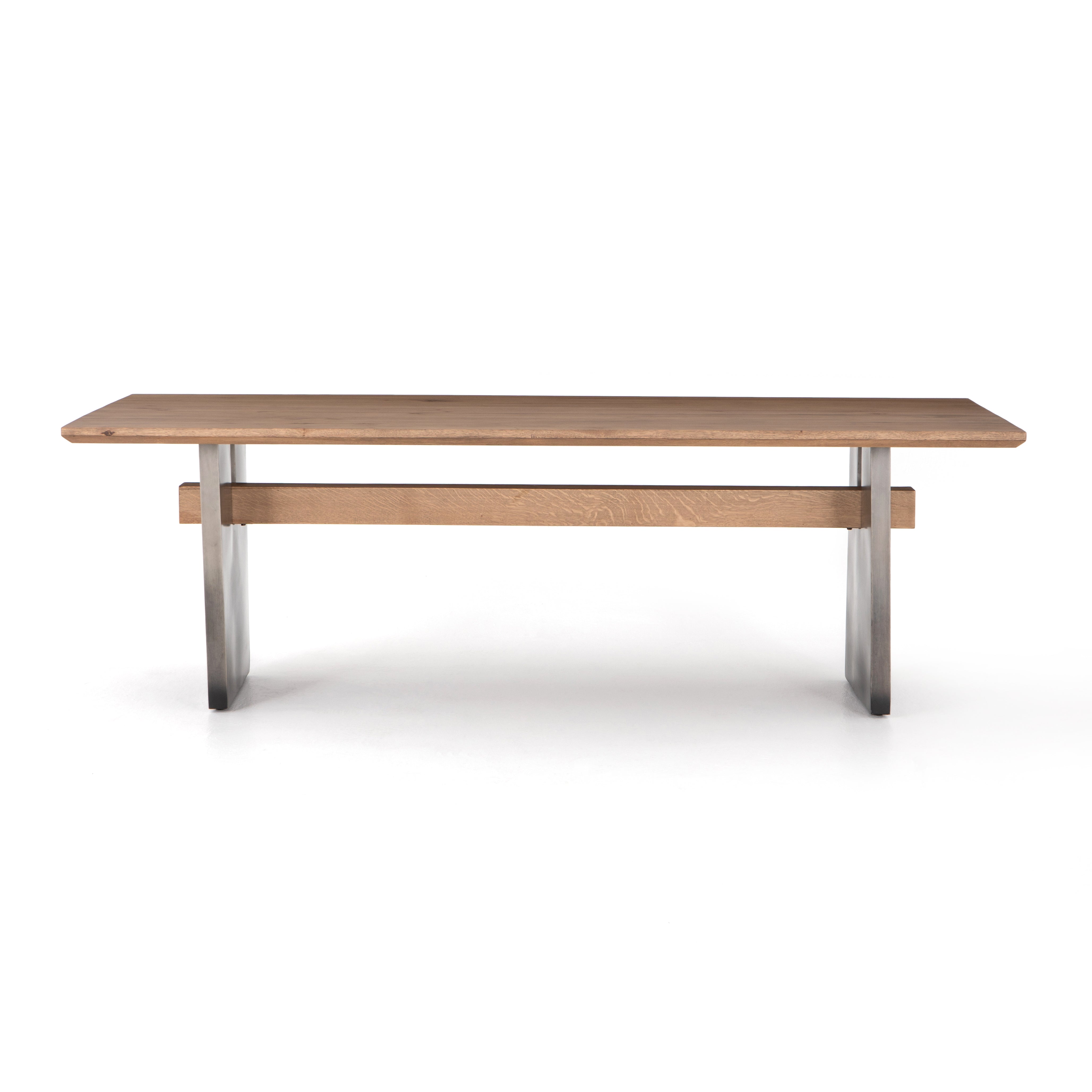 Featuring Brennan Dining Table - Dove Oak by Four Hands at Amethyst Home. This Brennan Dining Table - Dove Oak has a rectangular soft-grey oak tabletop and flaunts its materials' natural graining, for a richly organic takeaway. Wide, plank-style legs of pewter-finished steel features an ombre pattern -- a statement piece for any dining room or kitchen area..  Amethyst Home provides interior design, new home construction design consulting, vintage area rugs, and lighting in the Monterey metro area.