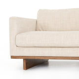 Featuring Everly Sofa - Irving Taupe by Four Hands at Amethyst Home. Classic goes contemporary with this Everly Sofa - Irving Taupe. A cocoa-finished parawood base supports low, deep seating of performance-grade upholstery in an invitingly neutral taupe, with track arms for a clean touch for any living room or lounge area. 
Overall Dimensions: 84"W x 43"L x.  Amethyst Home provides interior design, new home construction design consulting, vintage area rugs, and lighting in the Portland metro area.