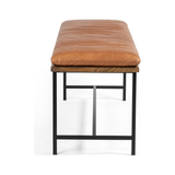 Featuring Gabine Accent Bench - Brandy by Four Hands at Amethyst Home. Airy, black-finished iron legs support a nettlewood dining bench of a chic, comfy layer of brandy top-grain leather on this Gabine Accent Bench - Brandy. A handsome piece to add to any bedroom, living room, or entryway. 
Overall Dimensions: 72"W x 18"L x 22"H
Colors: Midnight Iron, To.  Amethyst Home provides interior design, new home construction design consulting, vintage area rugs, and lighting in the Kansas City metro area.