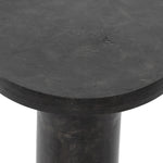 Featuring Gino End Table - Raw Black by Four Hands at Amethyst Home. Made from raw black cast aluminum, a dramatically tapered Gino End Table - Raw Black flaunts beautiful high/ low hues and subtle Brutalist vibes. Perfect for setting your book or favorite drink next to. 
Overall Dimensions: 13"W x 13"L x 20"H
Colors: Raw BlackMaterials: AluminumWeight: 13.  Amethyst Home provides interior design, new home construction design consulting, vintage area rugs, and lighting in the Charlotte metro area.