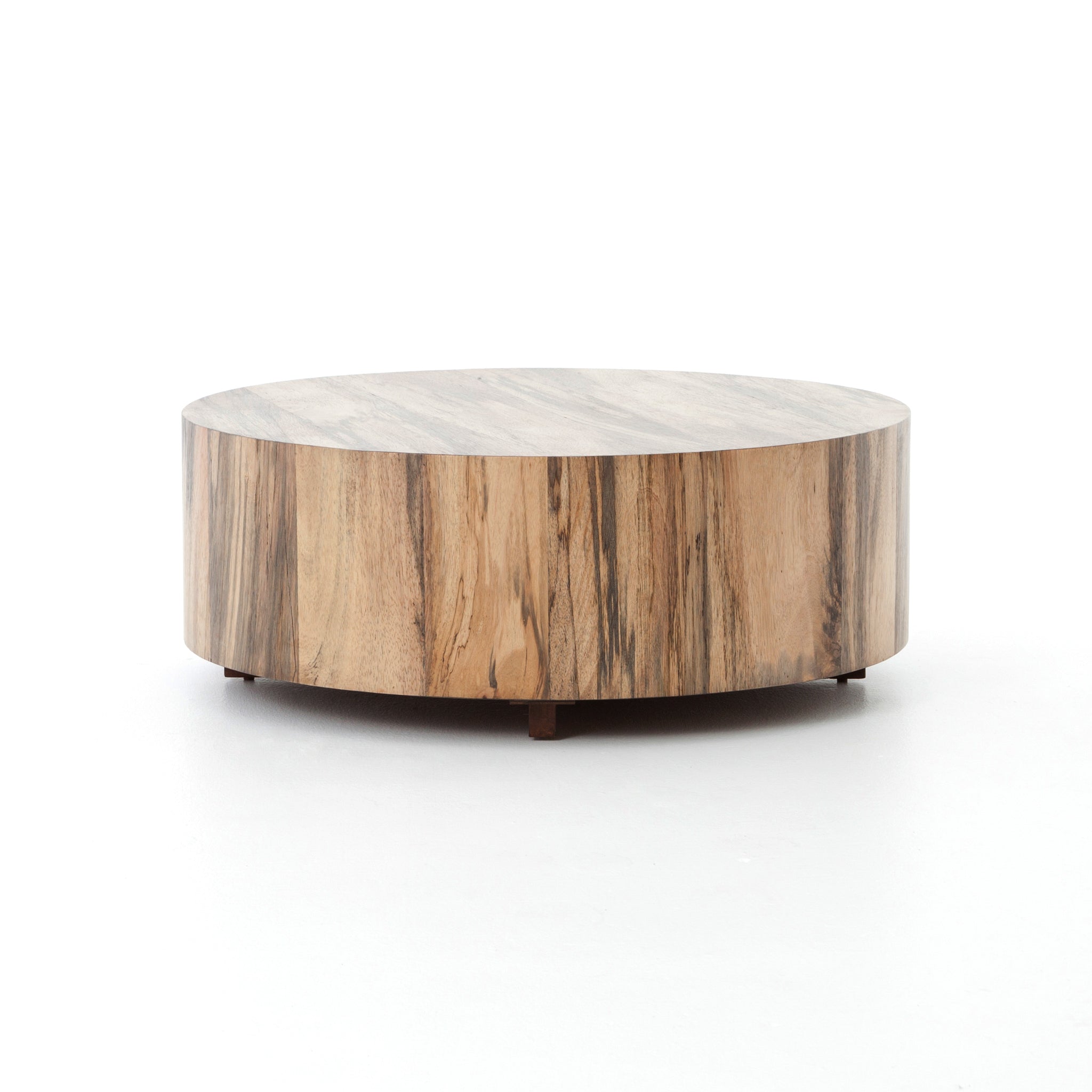 Featuring Hudson Coffee Table - Spalted Primavera by Four Hands at Amethyst Home. Stunning forces of nature are captured in the Hudson Spalted Primavera Coffee Table. We love how the spalted primavera wood is hand-shaped into a cylindrical silhouette. Reflective of woods' natural character, a slight color variance is possible. 
Overall Dimensions: 40"W x.  Amethyst Home provides interior design, new home construction design consulting, vintage area rugs, and lighting in the Kansas City metro area.