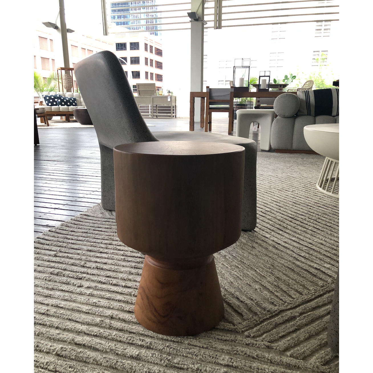 Featuring Jovie Outdoor End Table - Natural Teak by Four Hands at Amethyst Home. This Jovie Outdoor End Table - Natural Teak is made from solid teak and brings a bright, organic feel to any space. 
Amethyst Home celebrates natural materials, which often comes with beautiful imperfections. Each piece is made uniquely for you, please expect some variation a.  Amethyst Home provides interior design, new home construction design consulting, vintage area rugs, and lighting in the Des Moines metro area.