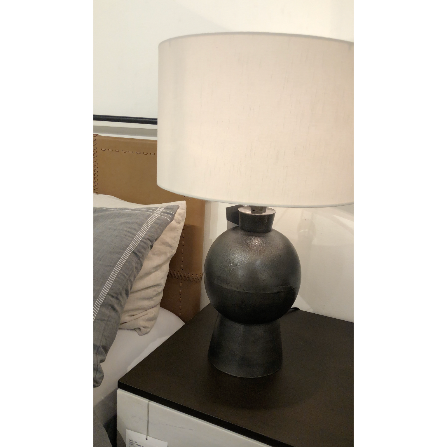 Featuring Kelita Textured Black Table Lamp by Four Hands at Amethyst Home. Textured black aluminum forms a shapely base to beautifully complement a white silk shade with this Kelita Textured Black Table Lamp. A beautiful lamp to place next your bed, sofa, or other area needing extra light.
Overall Dimensions: 16"W x 16"L x 25"H
Colors: Textured Black Aluminum,.  Amethyst Home provides interior design, new home construction design consulting, vintage area rugs, and lighting in the Tampa metro area.