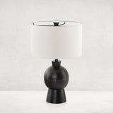 Featuring Kelita Textured Black Table Lamp by Four Hands at Amethyst Home. Textured black aluminum forms a shapely base to beautifully complement a white silk shade with this Kelita Textured Black Table Lamp. A beautiful lamp to place next your bed, sofa, or other area needing extra light.
Overall Dimensions: 16"W x 16"L x 25"H
Colors: Textured Black Alumi.  Amethyst Home provides interior design, new home construction design consulting, vintage area rugs, and lighting in the Park City metro area.