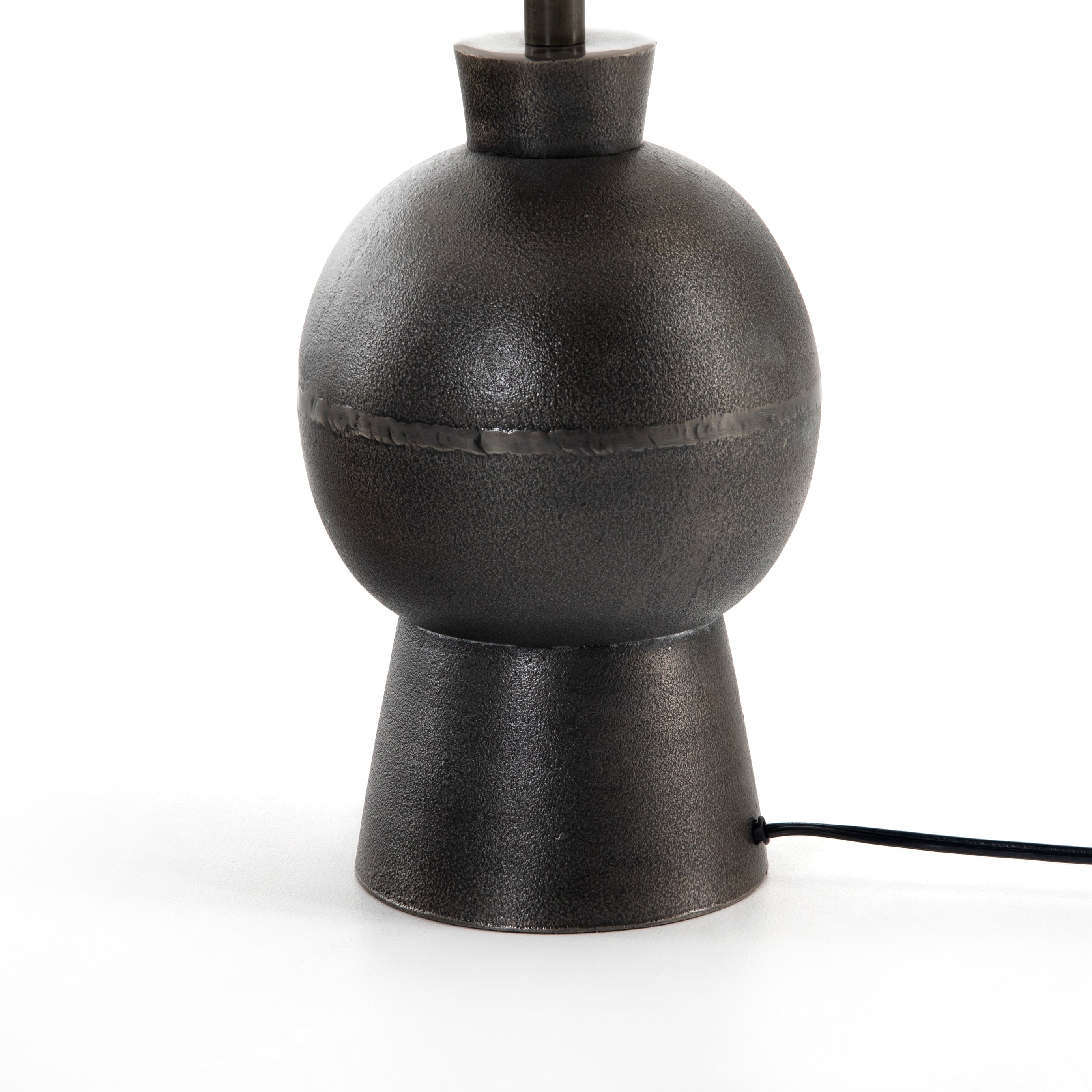 Featuring Kelita Textured Black Table Lamp by Four Hands at Amethyst Home. Textured black aluminum forms a shapely base to beautifully complement a white silk shade with this Kelita Textured Black Table Lamp. A beautiful lamp to place next your bed, sofa, or other area needing extra light.
Overall Dimensions: 16"W x 16"L x 25"H
Colors: Textured Black A.  Amethyst Home provides interior design, new home construction design consulting, vintage area rugs, and lighting in the Newport Beach metro area.