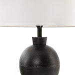 Featuring Kelita Textured Black Table Lamp by Four Hands at Amethyst Home. Textured black aluminum forms a shapely base to beautifully complement a white silk shade with this Kelita Textured Black Table Lamp. A beautiful lamp to place next your bed, sofa, or other area needing extra light.
Overall Dimensions: 16"W x 16"L x 25"H
Colors: Textured Black Alum.  Amethyst Home provides interior design, new home construction design consulting, vintage area rugs, and lighting in the Washington metro area.