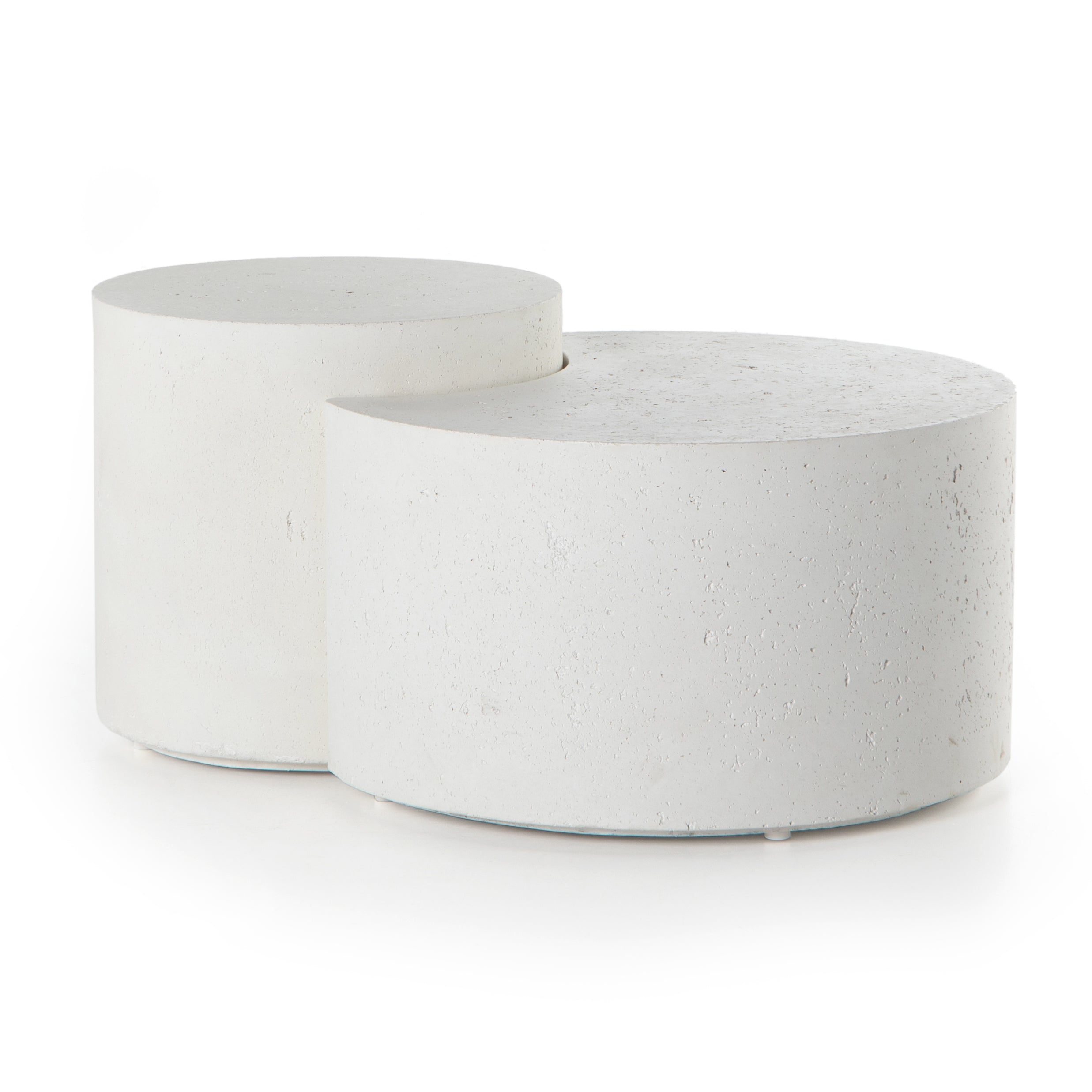 Featuring Meza Nesting Coffee Table - Textured White by Four Hands at Amethyst Home. Made from white-finished concrete with deep, textured pitting, this Meza Nesting Coffee Table - Textured White is sturdy and beautiful. Inspired by mid-century coral décor, this nesting coffee table features two tiers for a layered look with modernity.
Overall Dimensions: 43..  Amethyst Home provides interior design, new home construction design consulting, vintage area rugs, and lighting in the Dallas metro area.