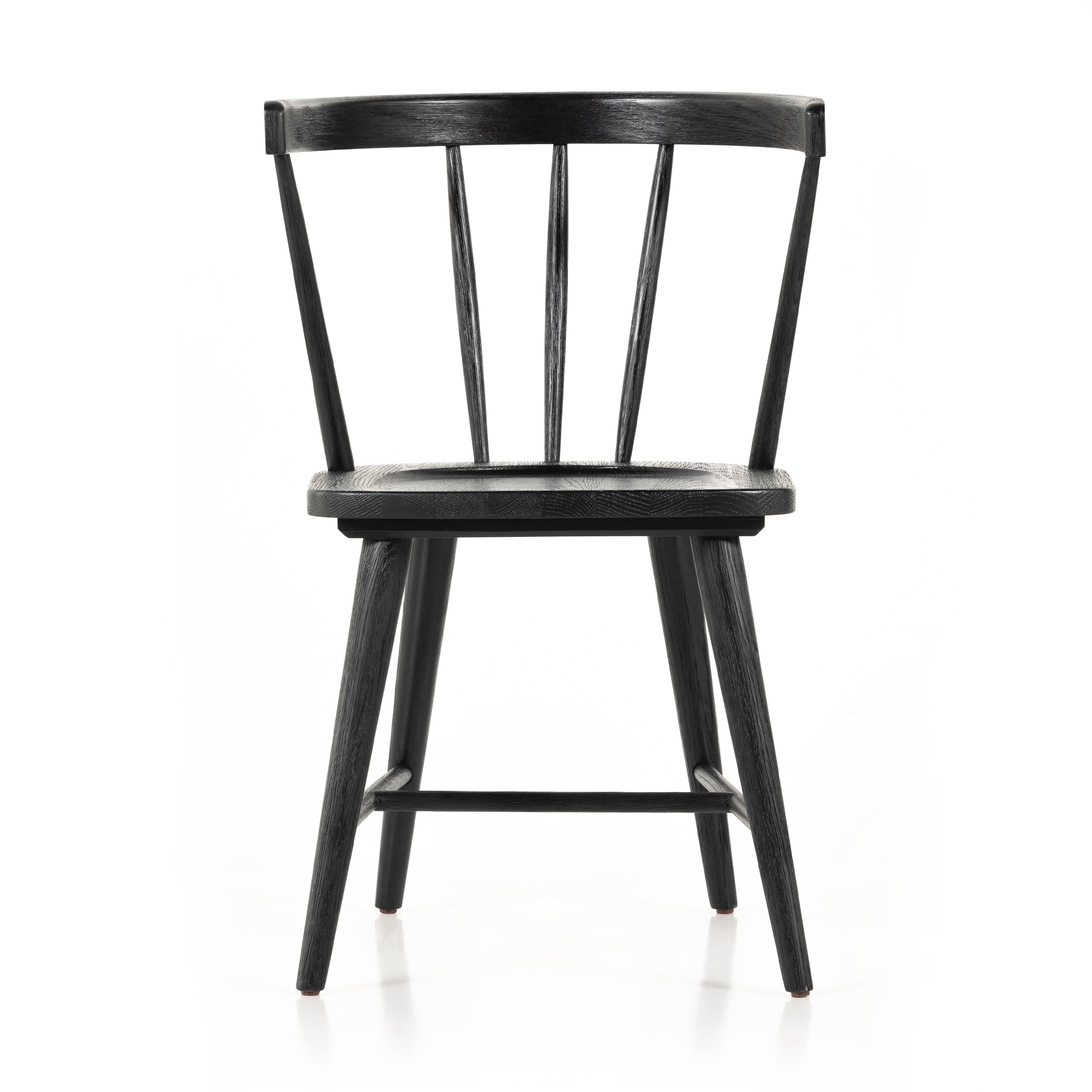 Featuring Naples Dining Chair - Black Oak by Four Hands at Amethyst Home. This Naples Dining Chair - Black Oak is a fresh twist on traditional Windsor-style seating is crafted from solid black-finished oak, for a look that’s always in style.
Overall Dimensions: 20.50"W x 21.50"L x 31.75"HColors: Black Oak, Black Oak VeneerMaterials: Solid Oak, Oak VeneerWeight.  Amethyst Home provides interior design, new home construction design consulting, vintage area rugs, and lighting in the Tampa metro area.