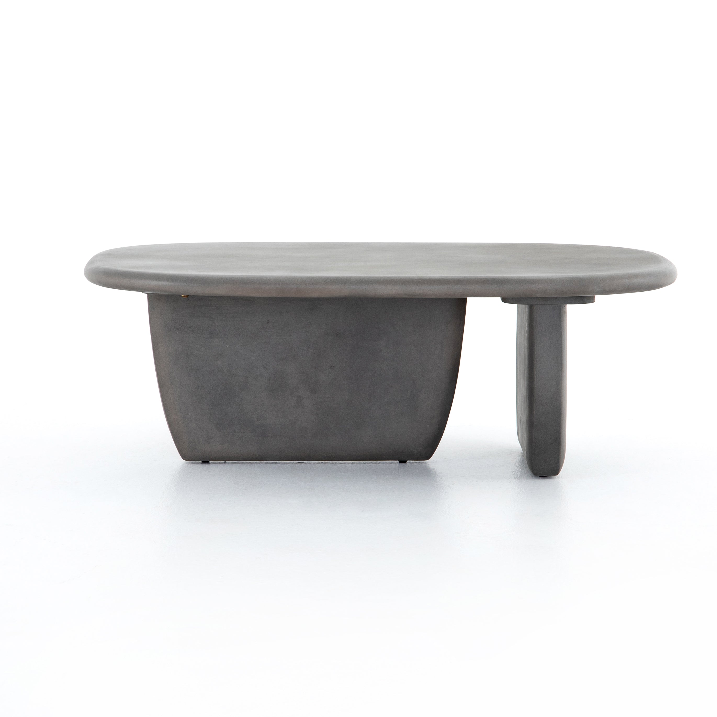 Featuring Naya Outdoor Coffee Table by Four Hands at Amethyst Home. This Naya Outdoor Coffee Table is modern and curve-driven. Dark grey concrete forms a rounded rectangle top with bullnose edging, reminiscent of a shapely surfboard.  Cover or store inside during inclement weather.
Overall Dimensions: 46"W x 28"L x 16"HColors: Dark GreyMaterials: ConcreteWe.  Amethyst Home provides interior design, new home construction design consulting, vintage area rugs, and lighting in the Monterey metro area.