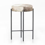 Featuring Nocona Bar + Counter Stool - Speckled Hide by Four Hands at Amethyst Home. The Nocona Speckled Hide Bar and Counter stool is modern minimalist to a T. Slim and airy, gunmetal-finished iron legs form a cradle-style frame for speckled hide seating, perfectly sized for the counter or bar. Each hide will be unique and will vary.
Bar Stool Size: 17.5. Amethyst Home provides interior design, new home construction design consulting, vintage area rugs, and lighting in the Los Angeles metro area.