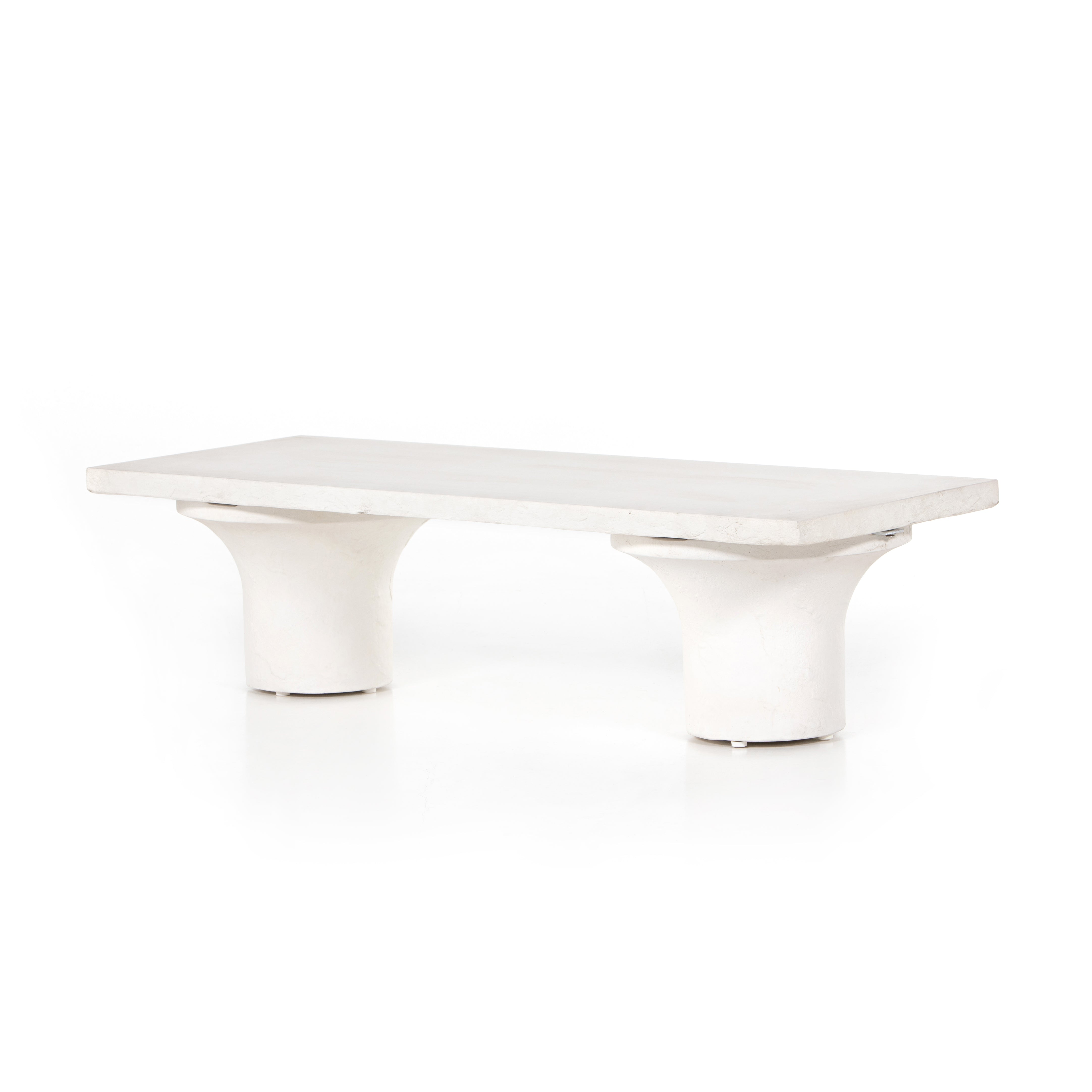Featuring Parra Coffee Table - Plaster Molded Concrete by Four Hands at Amethyst Home. Make a monolithic statement with this Parra Coffee Table - Plaster Molded Concrete. Made from plaster-molded concrete, the pedestal-style legs support a rectangular tabletop of smooth, white-finished concrete, for a clean, adobe-inspired look.
Overall Dimensions: 59.7.  Amethyst Home provides interior design, new home construction design consulting, vintage area rugs, and lighting in the Laguna Beach metro area.