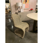 Featuring Portia Dining Chair - Grey Wash by Four Hands at Amethyst Home. Strike a pose. Finished in a washed grey, all-weather wicker seating curves for shapely intrigue, indoors or out. Cover or store inside during inclement weather and when not in use.
Overall Dimensions: 20.50"W x 27"L x 34"HColors: Grey WashMaterials: Banana LeafWeight: 37.7 lbVolume:.  Amethyst Home provides interior design, new home construction design consulting, vintage area rugs, and lighting in the Charlotte metro area.