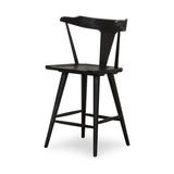 Featuring Ripley Black Oak Bar + Counter Stool by Four Hands at Amethyst Home. A fresh, bar-style take on mid-century Windsor seating is found in this Ripley Black Oak Bar + Counter Stool. Featuring a bowed, sculptural silhouette and soft black finish to highlight the natural grain of weathered oak.
Bar Overall Dimensions: 20.50"W x 20"L x 42.25"HSeat Dept.  Amethyst Home provides interior design, new home construction design consulting, vintage area rugs, and lighting in the Charlotte metro area.