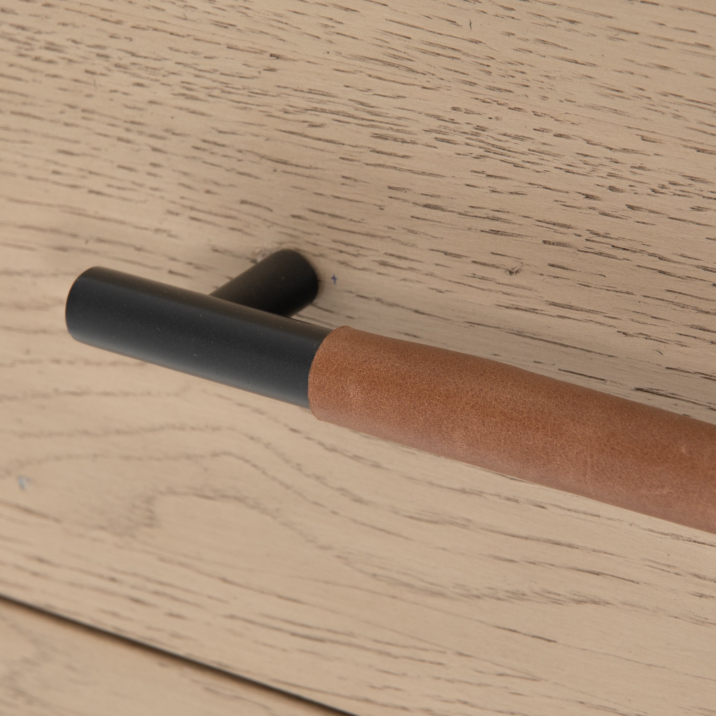 Featuring Rosedale 3 Drawer Dresser by Four Hands at Amethyst Home. The light-finished oak of this Rosedale 3 Drawer Dresser brings a clean, brightness to any room. We love how the three spacious drawers have iron hardware wrapped in a gorgeous, tan leather. The dimension legs with iron connecting them bring a unique look to your bedroom or other area.  Amethyst Home provides interior design, new home construction design consulting, vintage area rugs, and lighting in the Salt Lake City metro area.