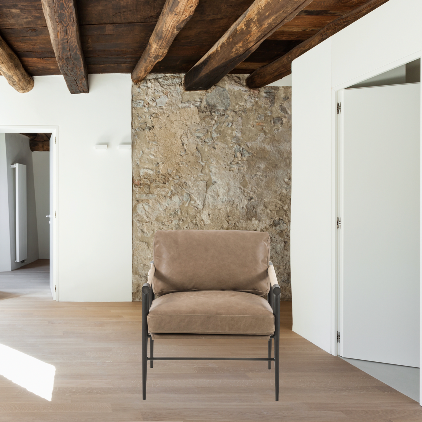 Featuring Rowen Chair - Palermo Drift by Four Hands at Amethyst Home. We love the slim, black steel frame of this Rowen Chair - Palermo Drift. Buttery, pronounced seating of tan top-grain leather with whitewashed ash accentuating angular arms make this an attractive seating choice for any living room, bedroom, or lounge area. 
Overall Dimensions: 27.50.  Amethyst Home provides interior design, new home construction design consulting, vintage area rugs, and lighting in the Newport Beach metro area.