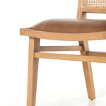 Featuring Sage Dining Chair - Sierra Butterscotch by Four Hands at Amethyst Home. Mixed materials make this Sage Dining Chair - Sierra Butterscotch. Solid, sand-colored beech wood features a natural cane back for extra texture, while a butterscotch-finished leather seat serves total comfort for any dining or kitchen area. 
Overall Dimensions: 20.50"W x.  Amethyst Home provides interior design, new home construction design consulting, vintage area rugs, and lighting in the Newport Beach metro area.