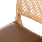 Featuring Sage Dining Chair - Sierra Butterscotch by Four Hands at Amethyst Home. Mixed materials make this Sage Dining Chair - Sierra Butterscotch. Solid, sand-colored beech wood features a natural cane back for extra texture, while a butterscotch-finished leather seat serves total comfort for any dining or kitchen area. 
Overall Dimensions: 20.50"W .  Amethyst Home provides interior design, new home construction design consulting, vintage area rugs, and lighting in the Salt Lake City metro area.