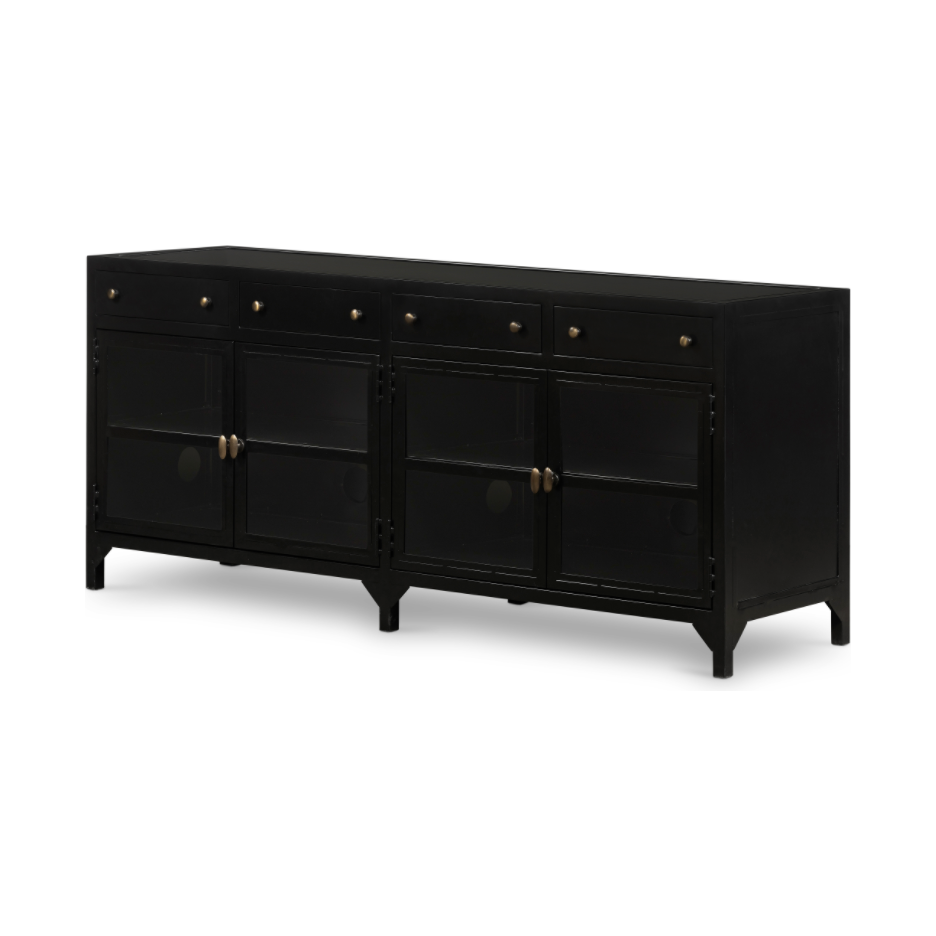 Featuring Shadow Box Media Console Table by Four Hands at Amethyst Home. This Shadow Box Media Console Table gives your inner collector a place to play. Frame prized possessions in a glass enclosure with matte-black metal and brass knobs.
Overall Dimensions: 69"W x 18"L x 29.25"H
Colors: Black, Tempered GlassMaterials: Iron, Tempered GlassWeight: 206.13 lb.  Amethyst Home provides interior design, new home construction design consulting, vintage area rugs, and lighting in the Park City metro area.