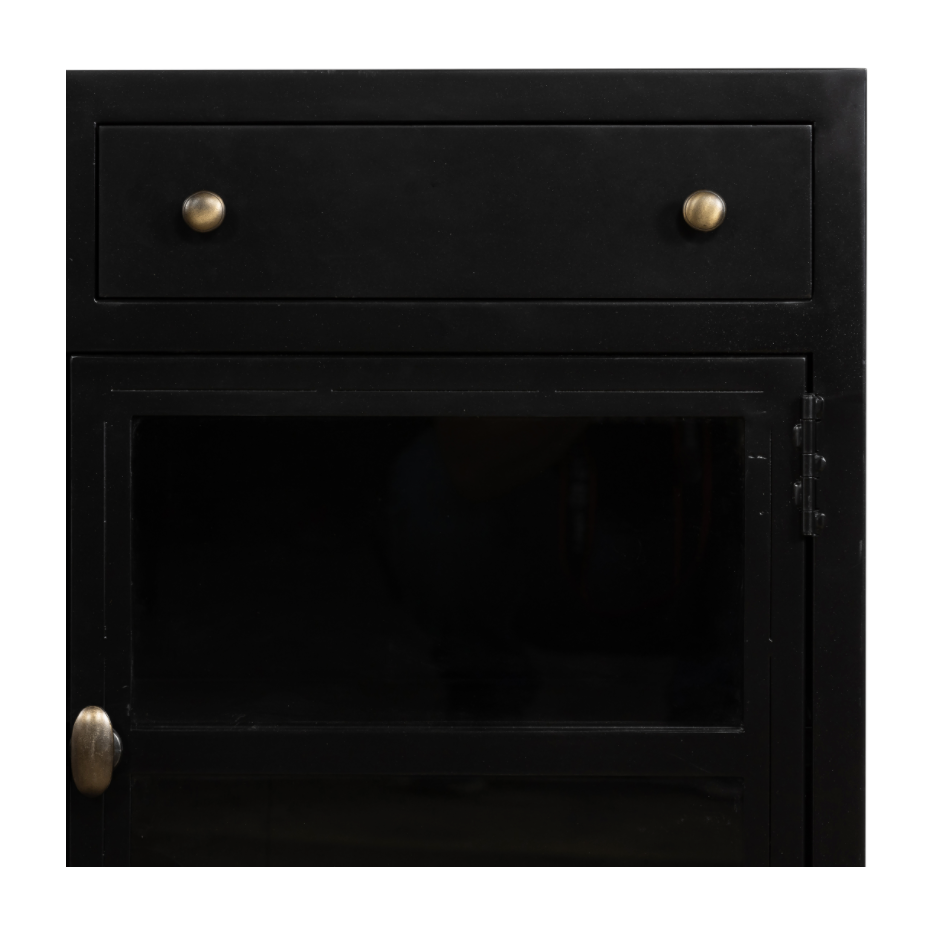Featuring Shadow Box Media Console Table by Four Hands at Amethyst Home. This Shadow Box Media Console Table gives your inner collector a place to play. Frame prized possessions in a glass enclosure with matte-black metal and brass knobs.
Overall Dimensions: 69"W x 18"L x 29.25"H
Colors: Black, Tempered GlassMaterials: Iron, Tempered GlassWeight: 206.13 lbVol.  Amethyst Home provides interior design, new home construction design consulting, vintage area rugs, and lighting in the Dallas metro area.