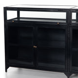 Featuring Shadow Box Sideboard - Black by Four Hands at Amethyst Home. This Shadow Box Sideboard gives your inner collector a place to play. Store prized possessions behind clear glass fronts, with black-finished metal casing and brass hardware for contrast.
Overall Dimensions: 70"W x 17.25"L x 35"H
Colors: Black, Weathered Bronze, Clear Glass, Tempered G.  Amethyst Home provides interior design, new home construction design consulting, vintage area rugs, and lighting in the Washington metro area.