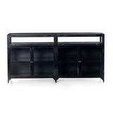 Featuring Shadow Box Sideboard - Black by Four Hands at Amethyst Home. This Shadow Box Sideboard gives your inner collector a place to play. Store prized possessions behind clear glass fronts, with black-finished metal casing and brass hardware for contrast.
Overall Dimensions: 70"W x 17.25"L x 35"H
Colors: Black, Weathered Bronze, Clear Glass, Tempered G.  Amethyst Home provides interior design, new home construction design consulting, vintage area rugs, and lighting in the Scottsdale metro area.