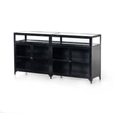 Featuring Shadow Box Sideboard - Black by Four Hands at Amethyst Home. This Shadow Box Sideboard gives your inner collector a place to play. Store prized possessions behind clear glass fronts, with black-finished metal casing and brass hardware for contrast.
Overall Dimensions: 70"W x 17.25"L x 35"H
Colors: Black, Weathered Bronze, Clear Glass, Tempere.  Amethyst Home provides interior design, new home construction design consulting, vintage area rugs, and lighting in the Newport Beach metro area.