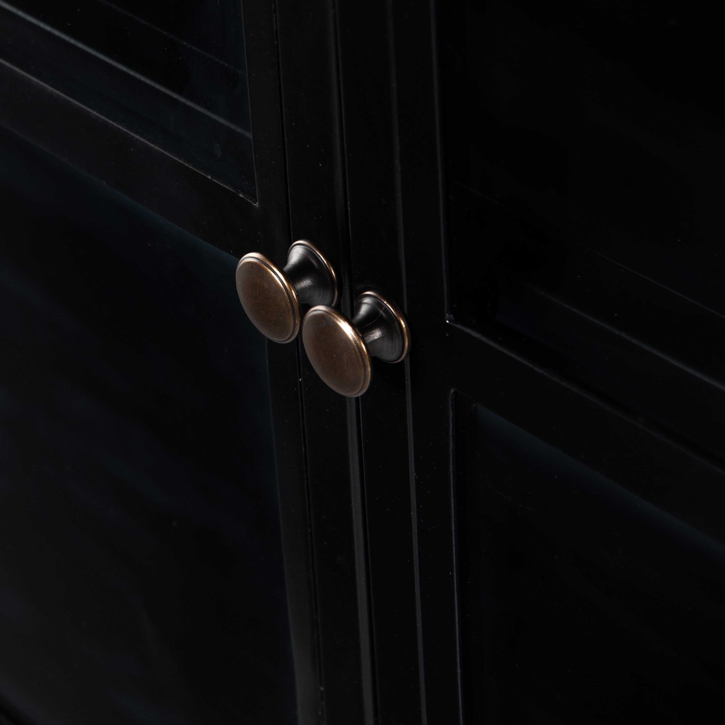 Featuring Shadow Box Sideboard - Black by Four Hands at Amethyst Home. This Shadow Box Sideboard gives your inner collector a place to play. Store prized possessions behind clear glass fronts, with black-finished metal casing and brass hardware for contrast.
Overall Dimensions: 70"W x 17.25"L x 35"H
Colors: Black, Weathered Bronze, Clear Glass, Tempered .  Amethyst Home provides interior design, new home construction design consulting, vintage area rugs, and lighting in the Los Angeles metro area.